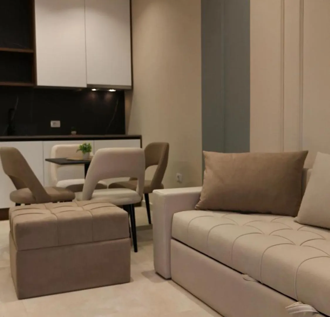White Arena Apartments Golem
