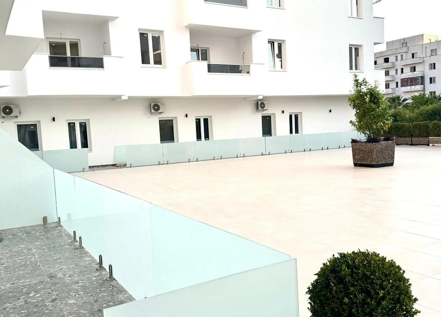 White Arena Apartments Golem
