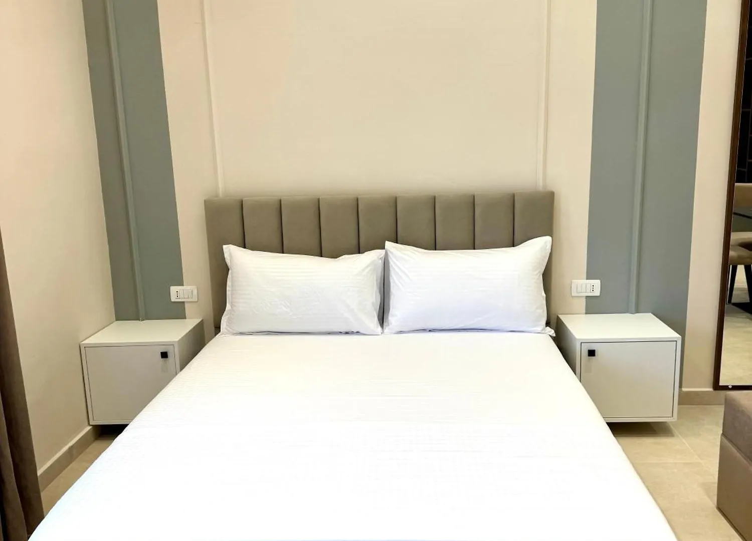 White Arena Apartments Golem